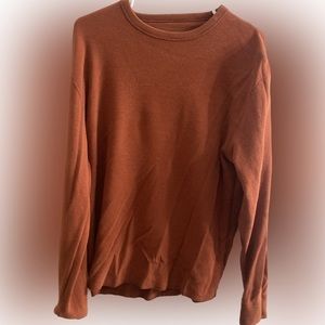 Orangey-red crew neck